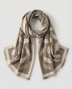 Beige and brown wrap with feather pattern on a light gray background, view 1