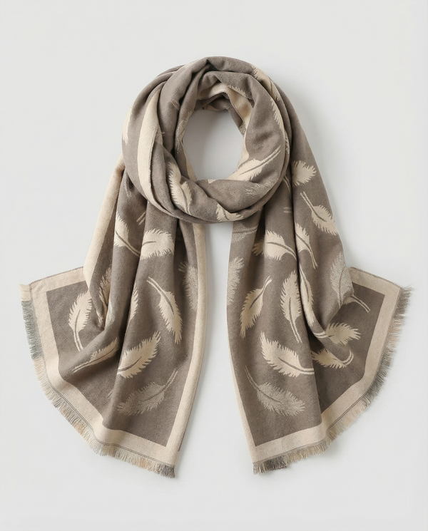 Beige and brown wrap with feather pattern on a light gray background