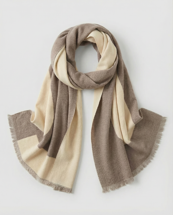 Beige and brown wrap with horse head motif on a light gray background