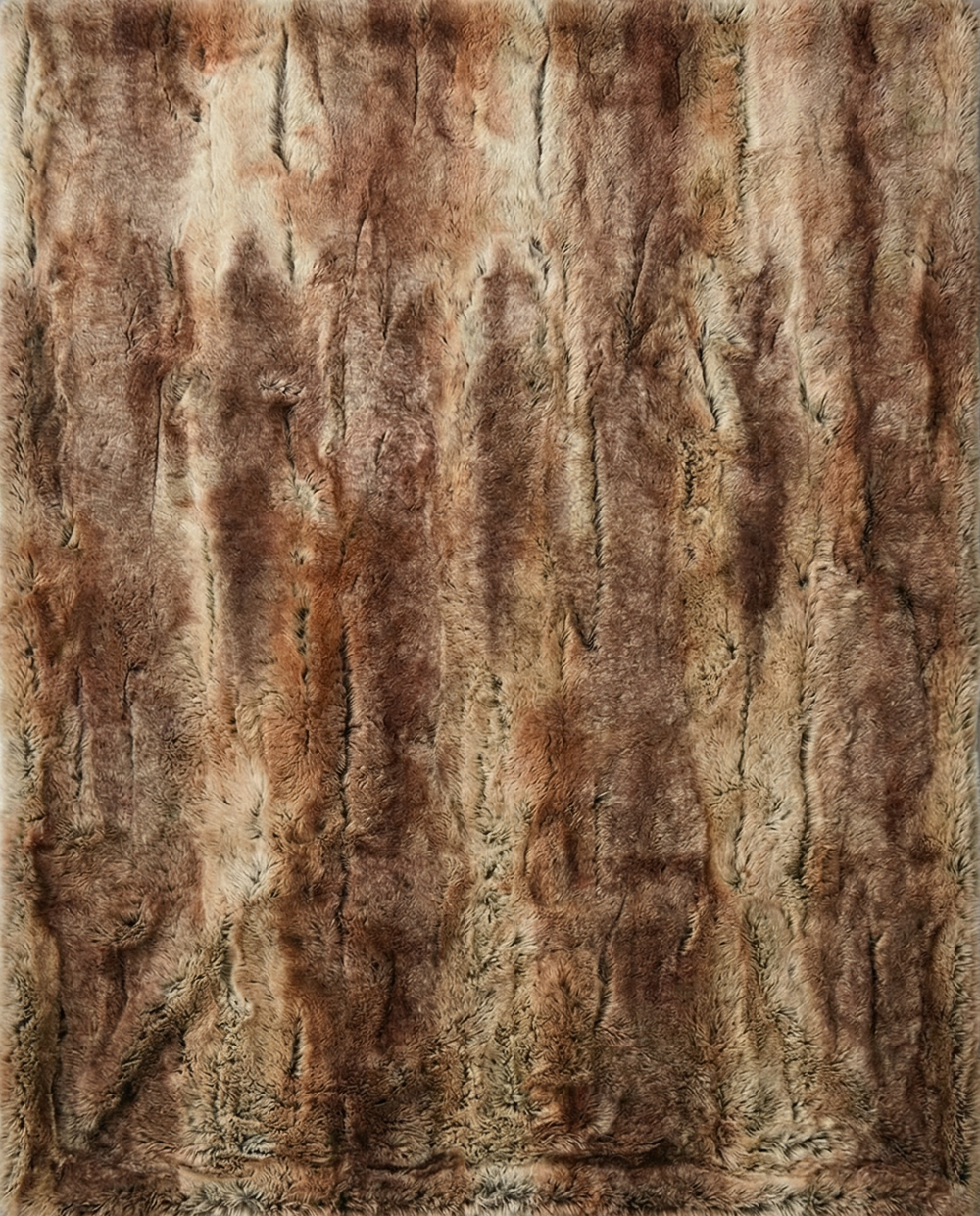 Textured brown fabric on a gray background