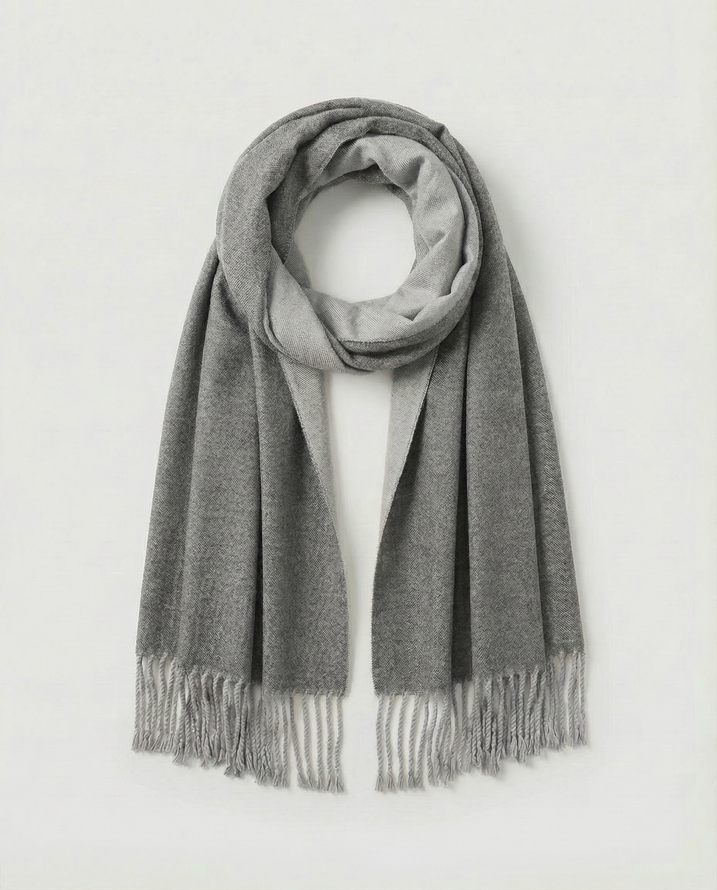 Gray wrap with fringes on a white background