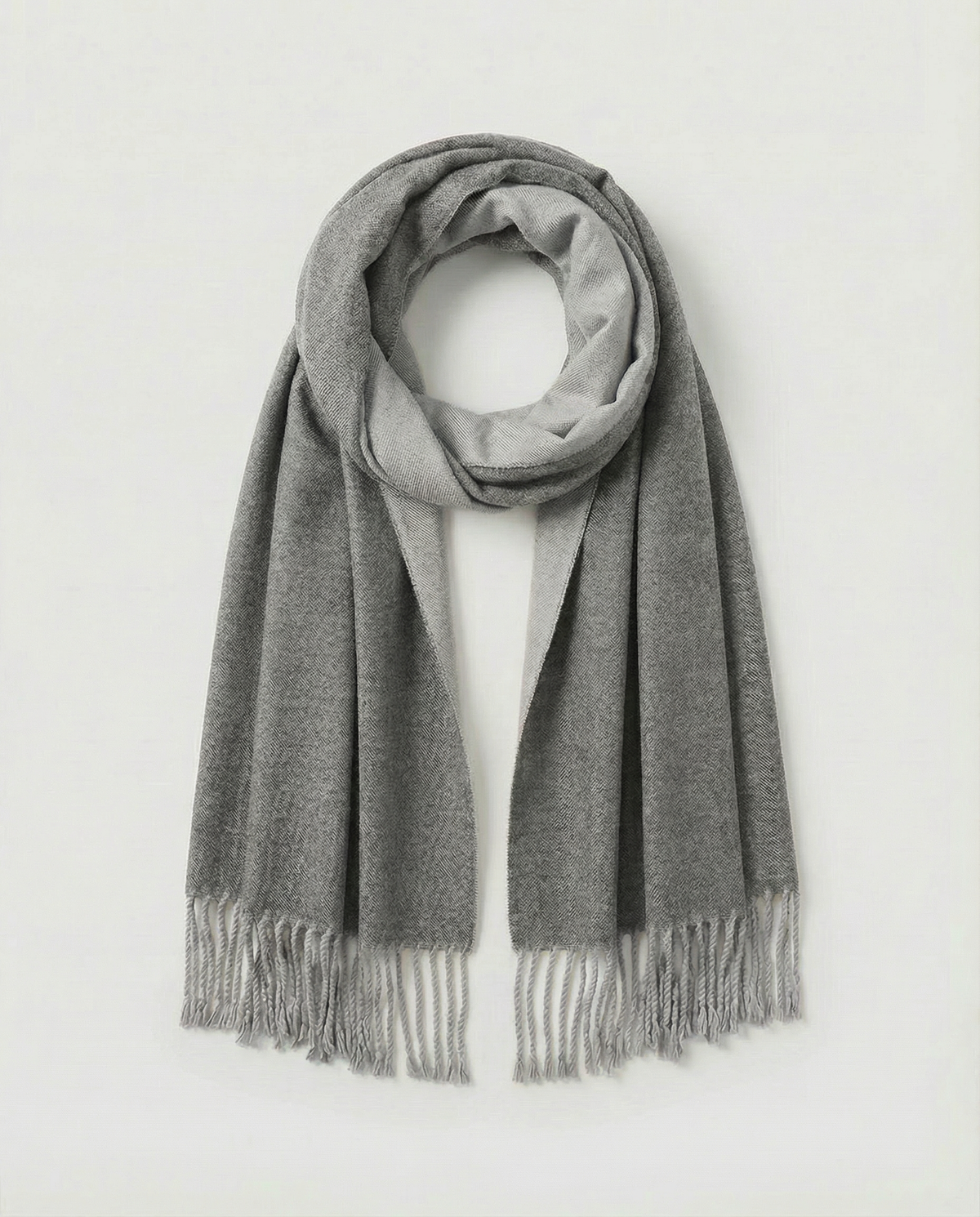 Gray wrap with fringes on a white background