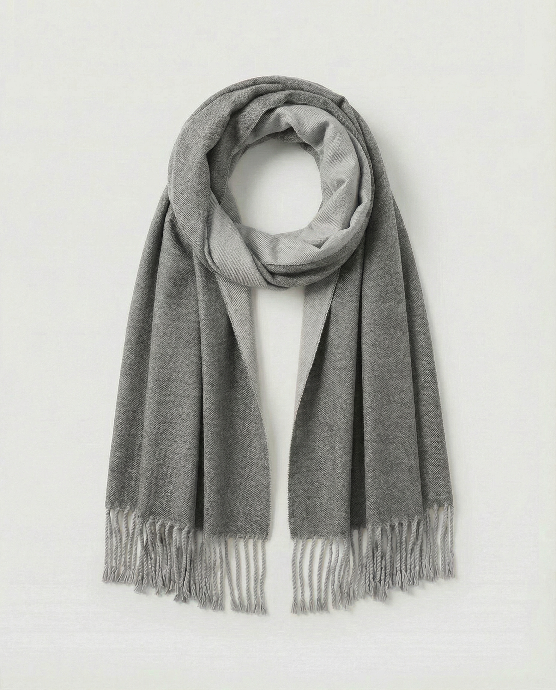 Gray wrap with fringes on a white background