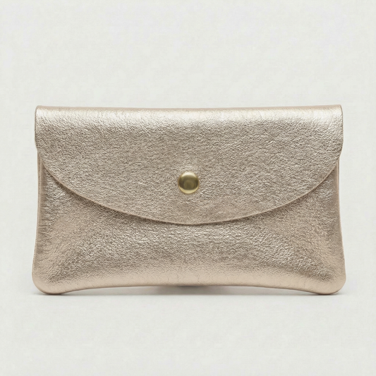 Mini coin wallet in gold metallic leather with snap closure, compact Italian‑made design for coins and small essentials