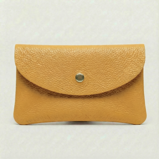 Flamingo color leather cellphone wallet with a gold button on a white background.