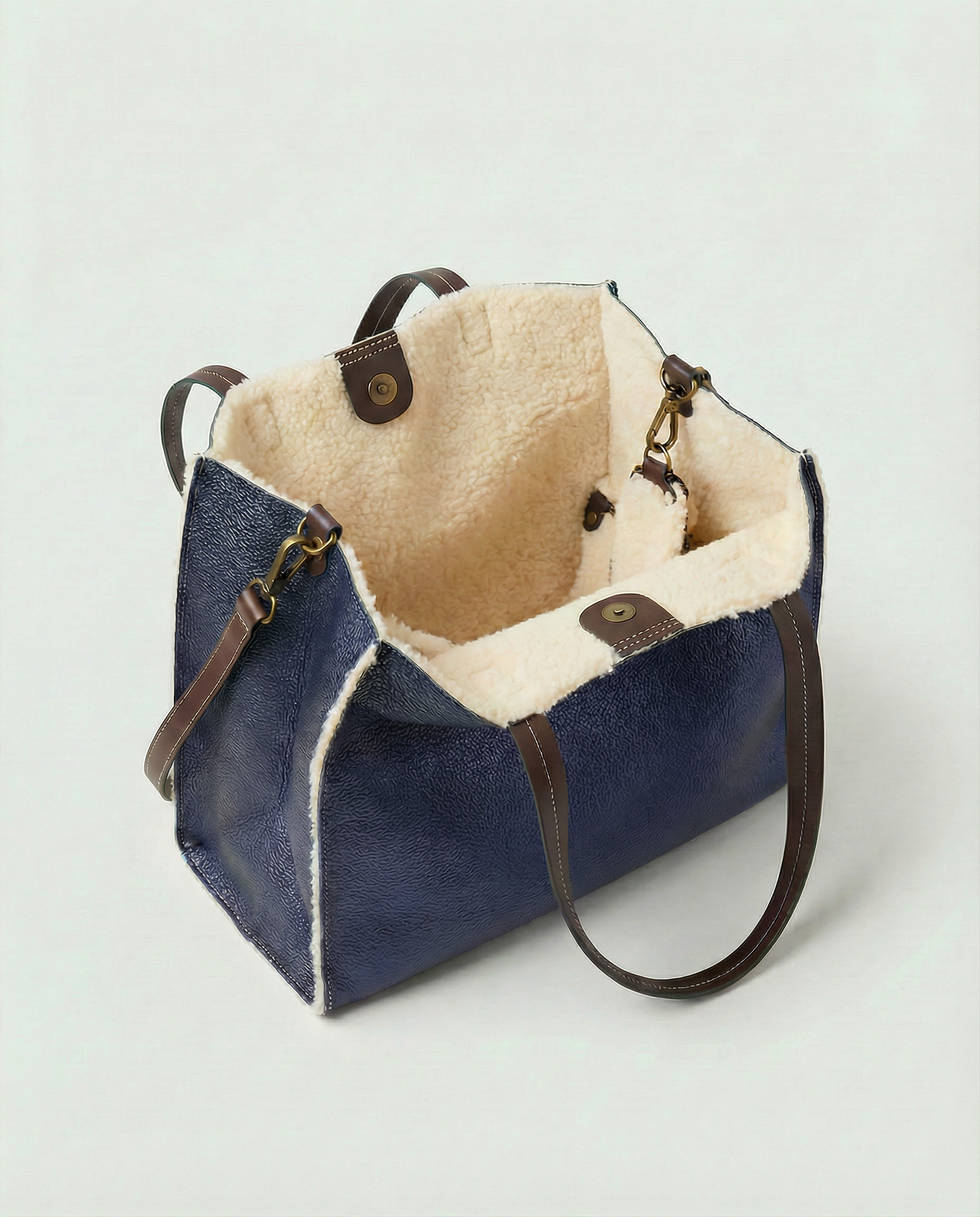 Metallic Indigo leather Paris tote bag available in Paris Tote and Mini Paris Tote sizes.