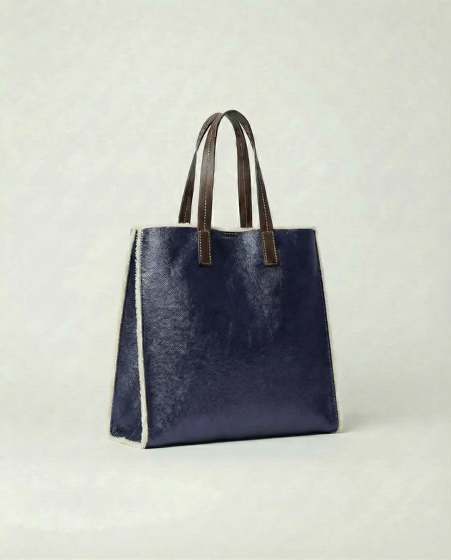 Metallic Indigo leather Paris tote bag available in Paris Tote and Mini Paris Tote sizes.