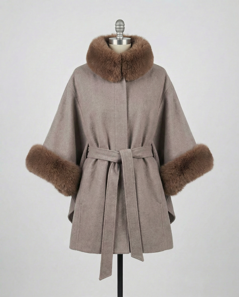 Mocha Janelle coat with brown fur trim on a mannequin against a gray background.