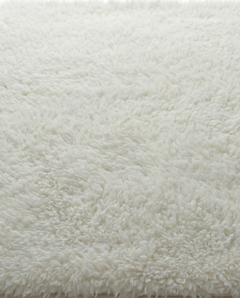 Lamb’s Wool Throw in Ivory with a soft, natural wool texture., view 1