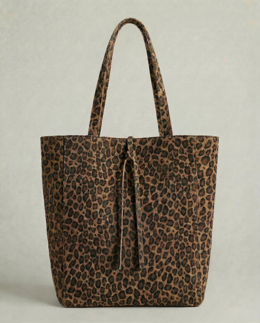 Leopard pebble leather tote bag with structured shape and elegant, minimalist design.