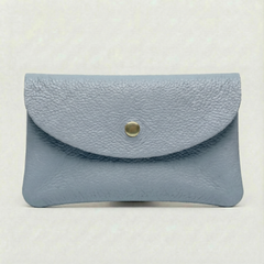 Light Blue pebble leather wallet collection featuring Mini Coin Wallet, Coin Wallet, and Cellphone Wallet in genuine leather, made in Italy., view 1