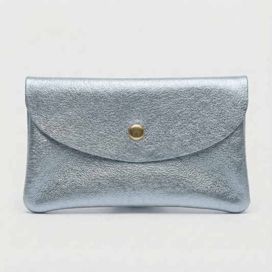 Light Blue metallic leather coin wallet with textured finish, snap closure, compact Italian‑made design, stylish everyday accessory