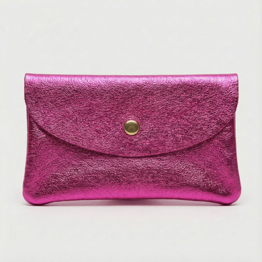 Magenta metallic cellphone wallet with a gold button on a light gray background