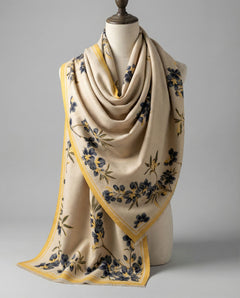 Beige wrap with floral pattern on a mannequin against a gray background, view 2