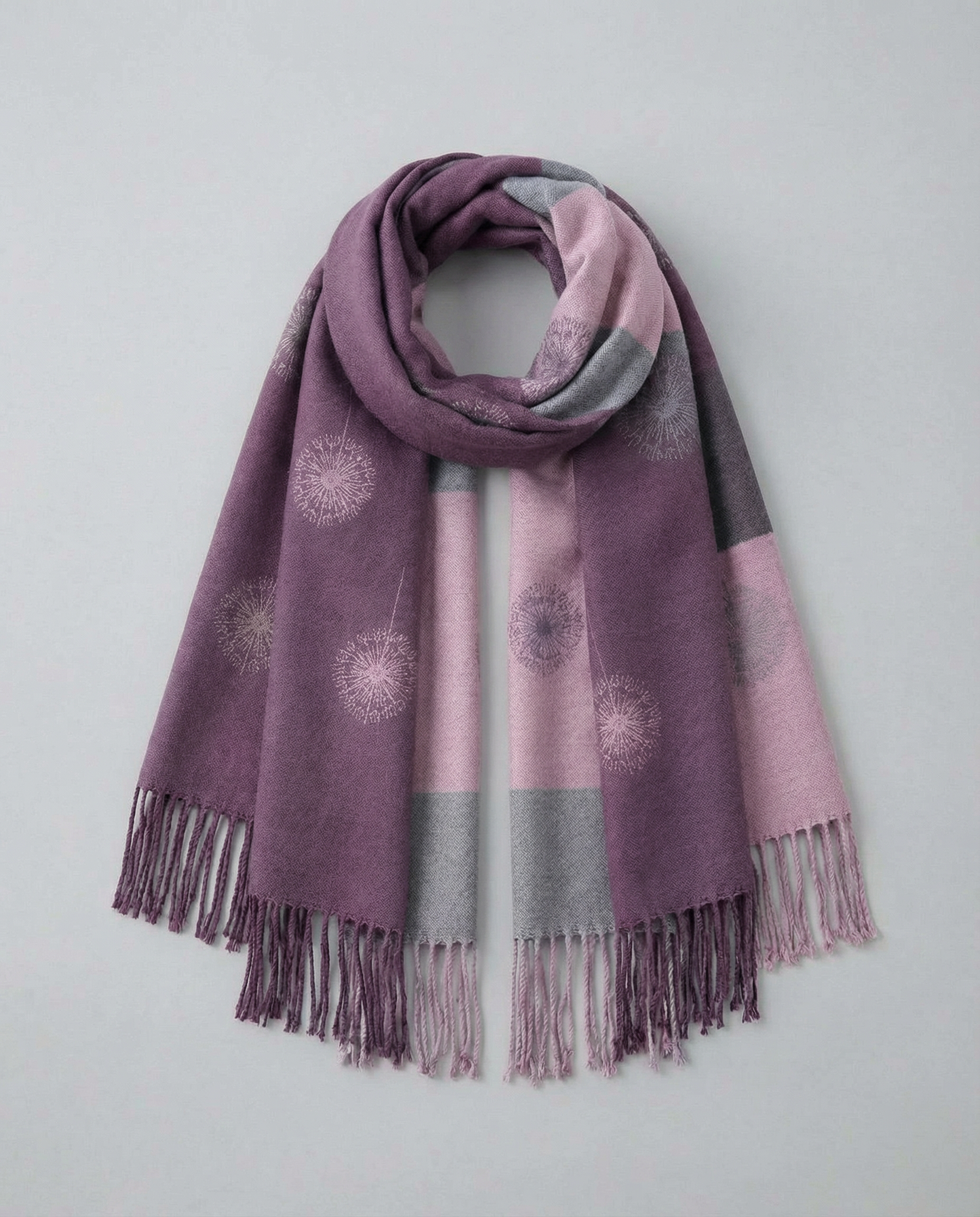 Multicolored wrap with floral patterns on a light gray background