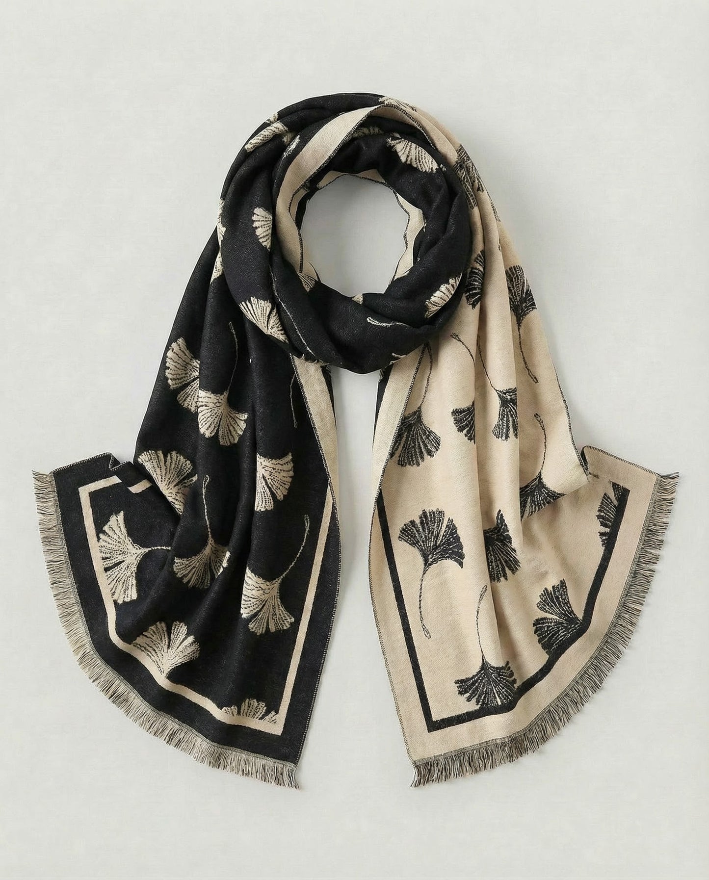 Black and beige patterned wrap on a light gray background