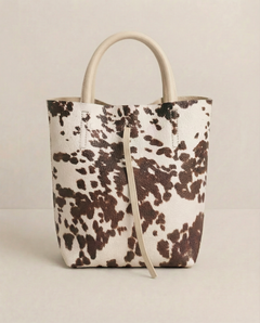 Cow pebble leather mini tote with structured silhouette, detachable crossbody strap, compact interior, and genuine Italian craftsmanship.
, view 1