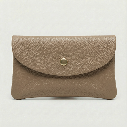Mocha pebble leather coin wallet with snap closure, minimalist Italian design, compact and elegant everyday accessory.