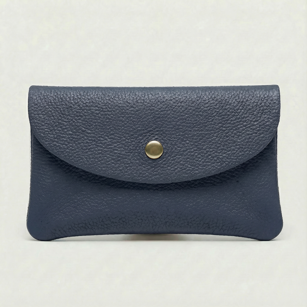 Navy pebble leather wallet collection featuring Mini Coin Wallet, Coin Wallet, and Cellphone Wallet in genuine leather, made in Italy.