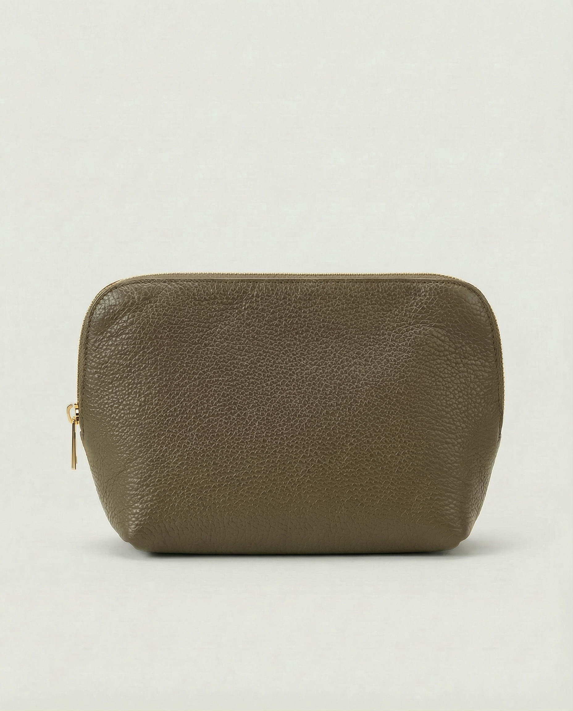 Pebble leather cosmetic bag with zip closure, available in olive, structured silhouette for everyday essentials.