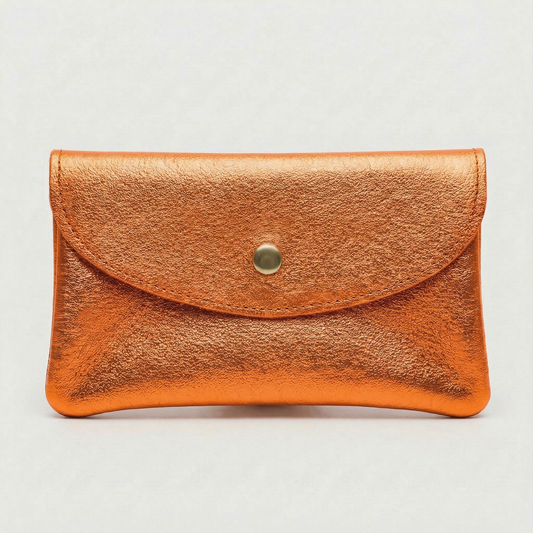 Mini coin wallet in orange metallic leather with snap closure, compact Italian‑made design for coins and small essentials