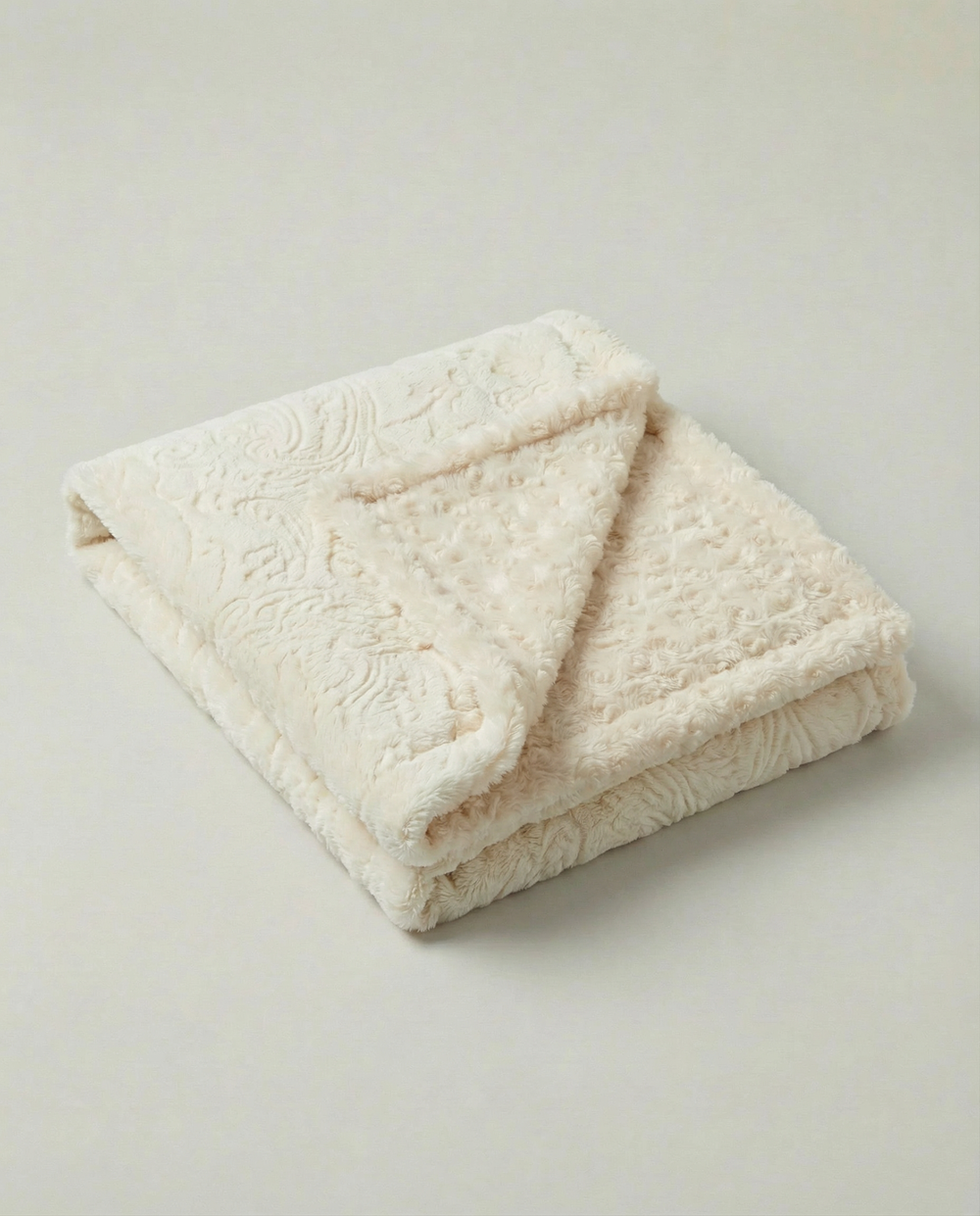 Paisley Throw in Embossed Beige, plush faux-fur blanket