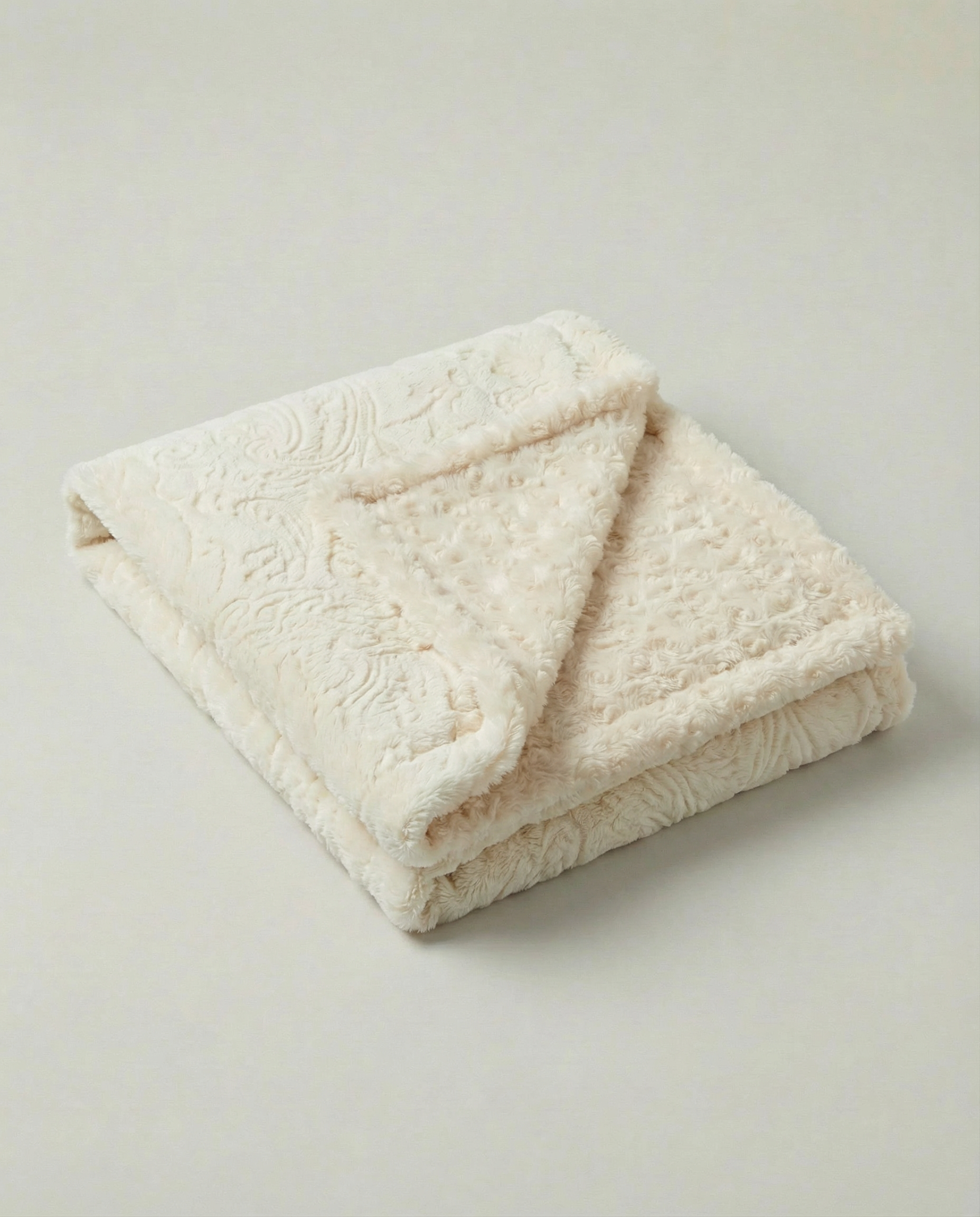 Paisley Throw in Embossed Beige, plush faux-fur blanket