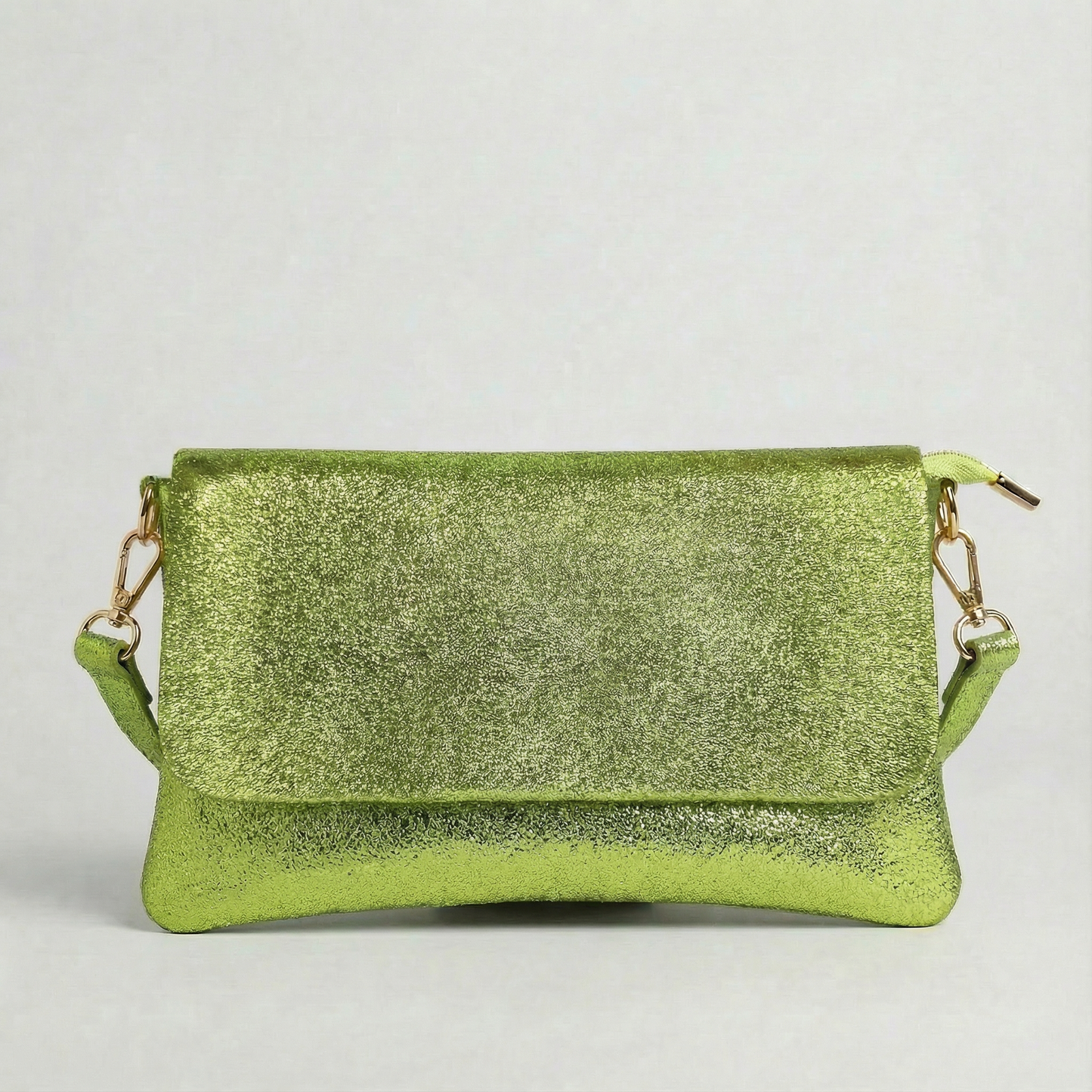 Neon Green metallic leather crossbody bag with a matching color leather strap, displayed on a light gray background.