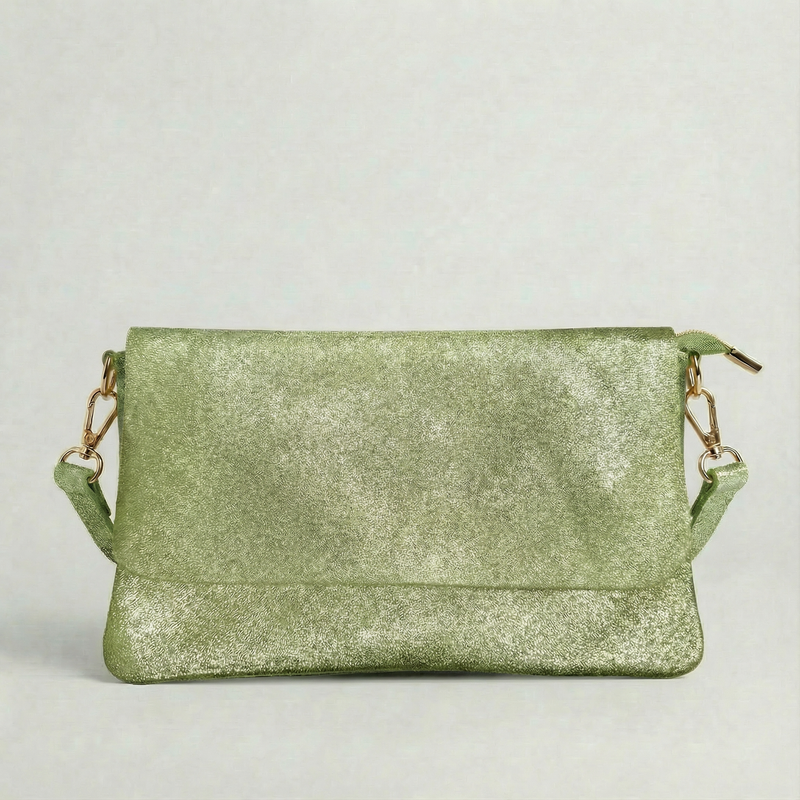 Spruce metallic leather crossbody bag with a matching color leather strap, displayed on a light gray background.  