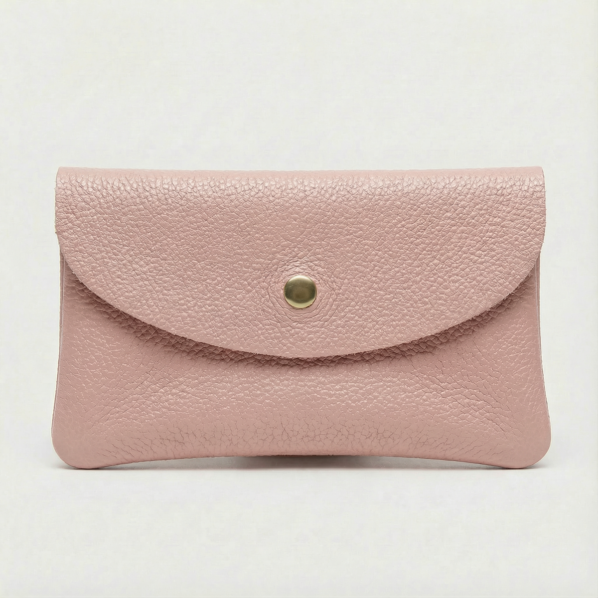 Dusty Pink pebble leather wallet collection featuring Mini Coin Wallet, Coin Wallet, and Cellphone Wallet in genuine leather, made in Italy.