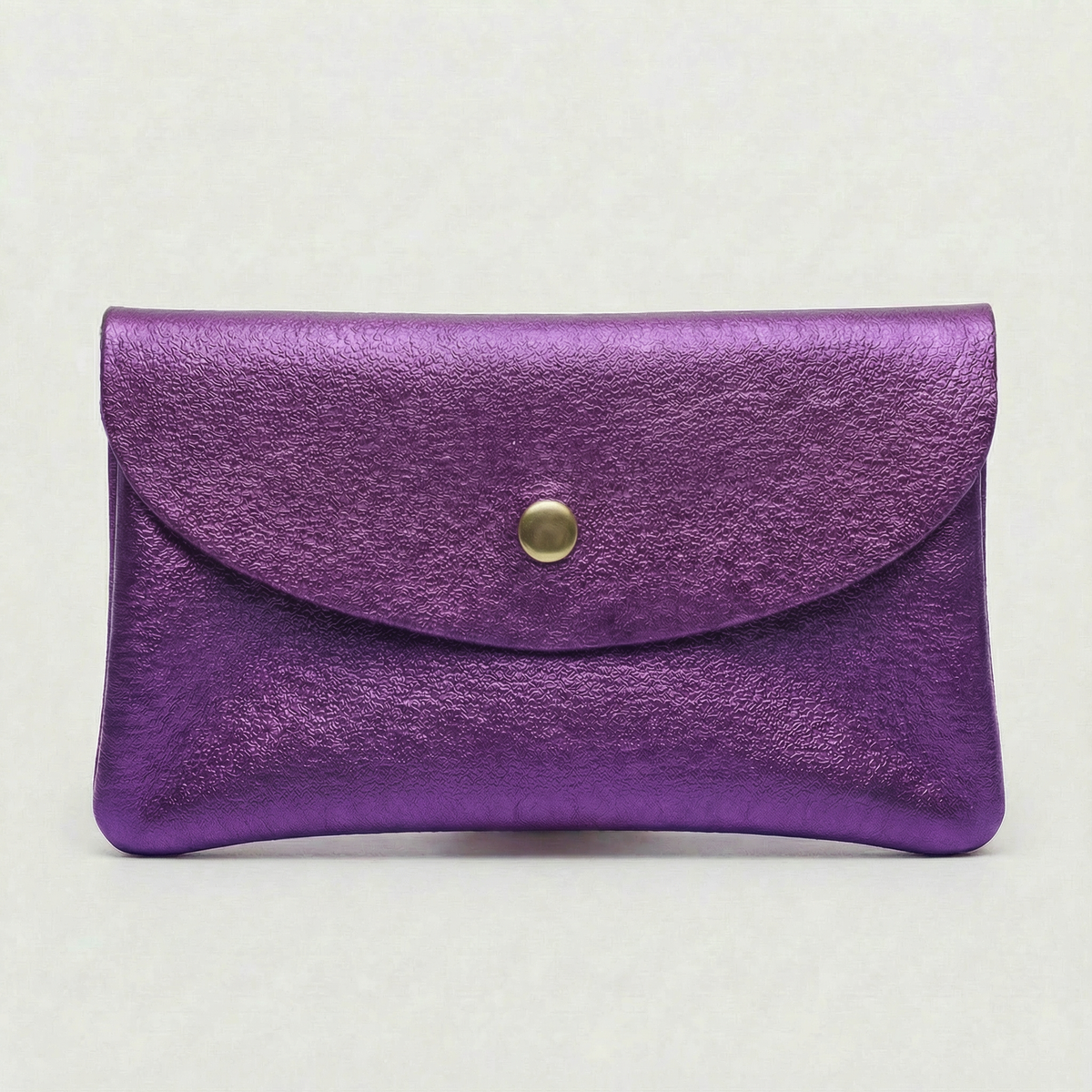Purple metallic leather wallet available in mini coin wallet, coin wallet, and cellphone wallet sizes.