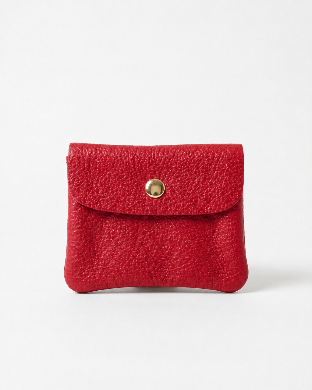 Red pebble leather mini coin wallet with snap closure, compact Italian‑made design for coins and small essentials