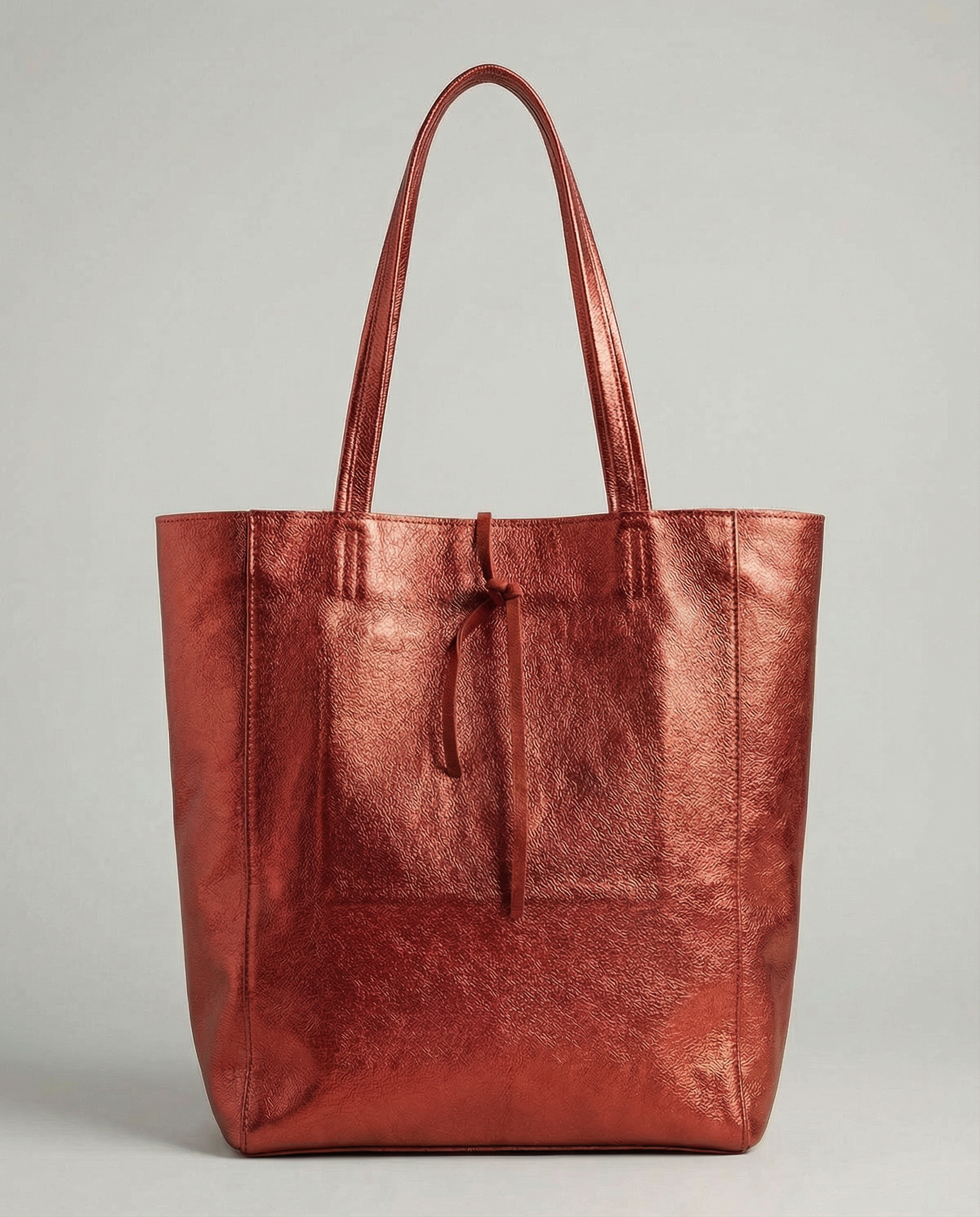 Red metallic leather tote bag available in Tote Bag and Mini Tote sizes. 