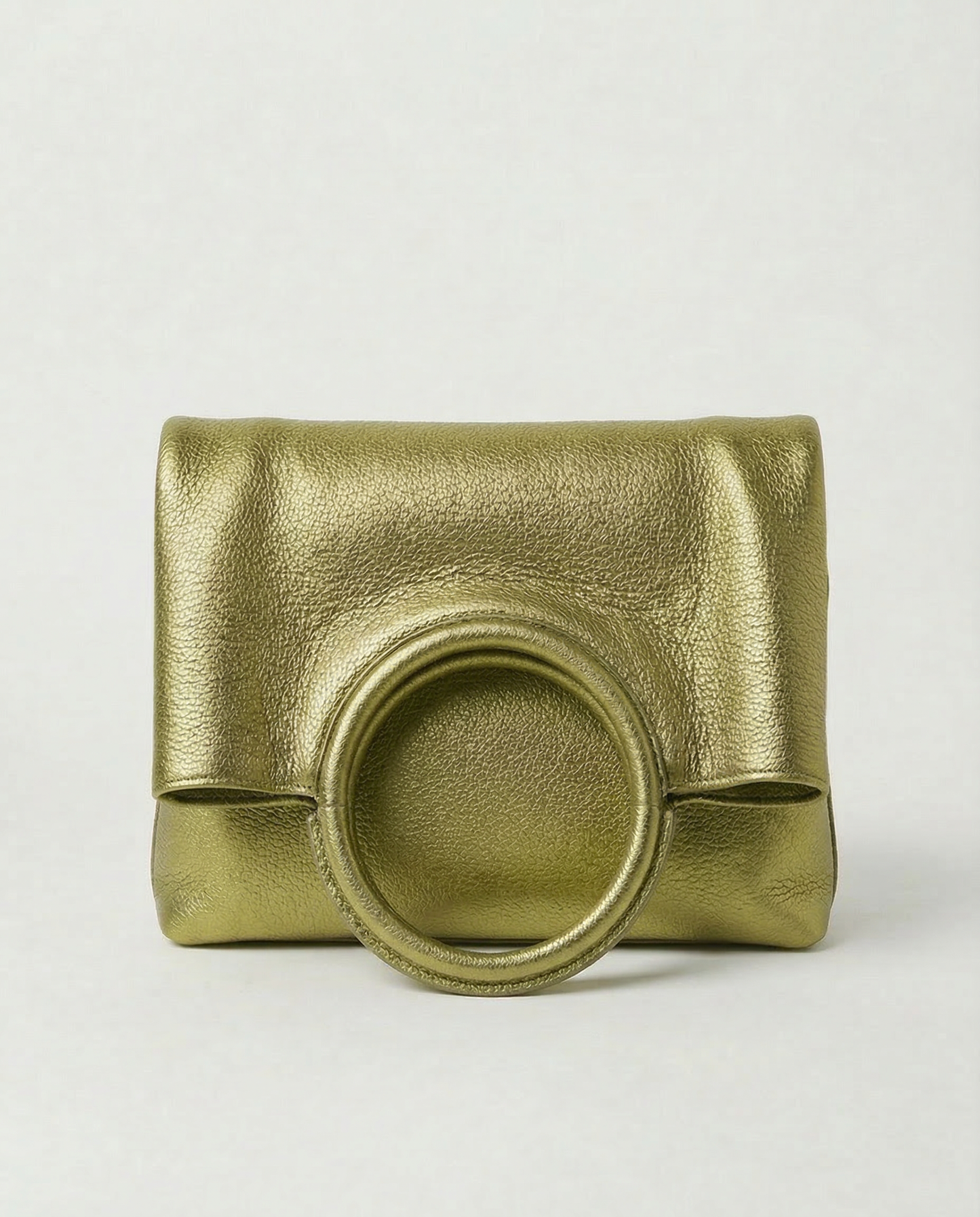Pistachio metallic ring bag with circular handles on a light gray background