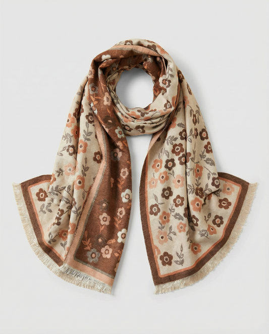 Floral patterned wrap with dark orange and beige colors on a light gray background