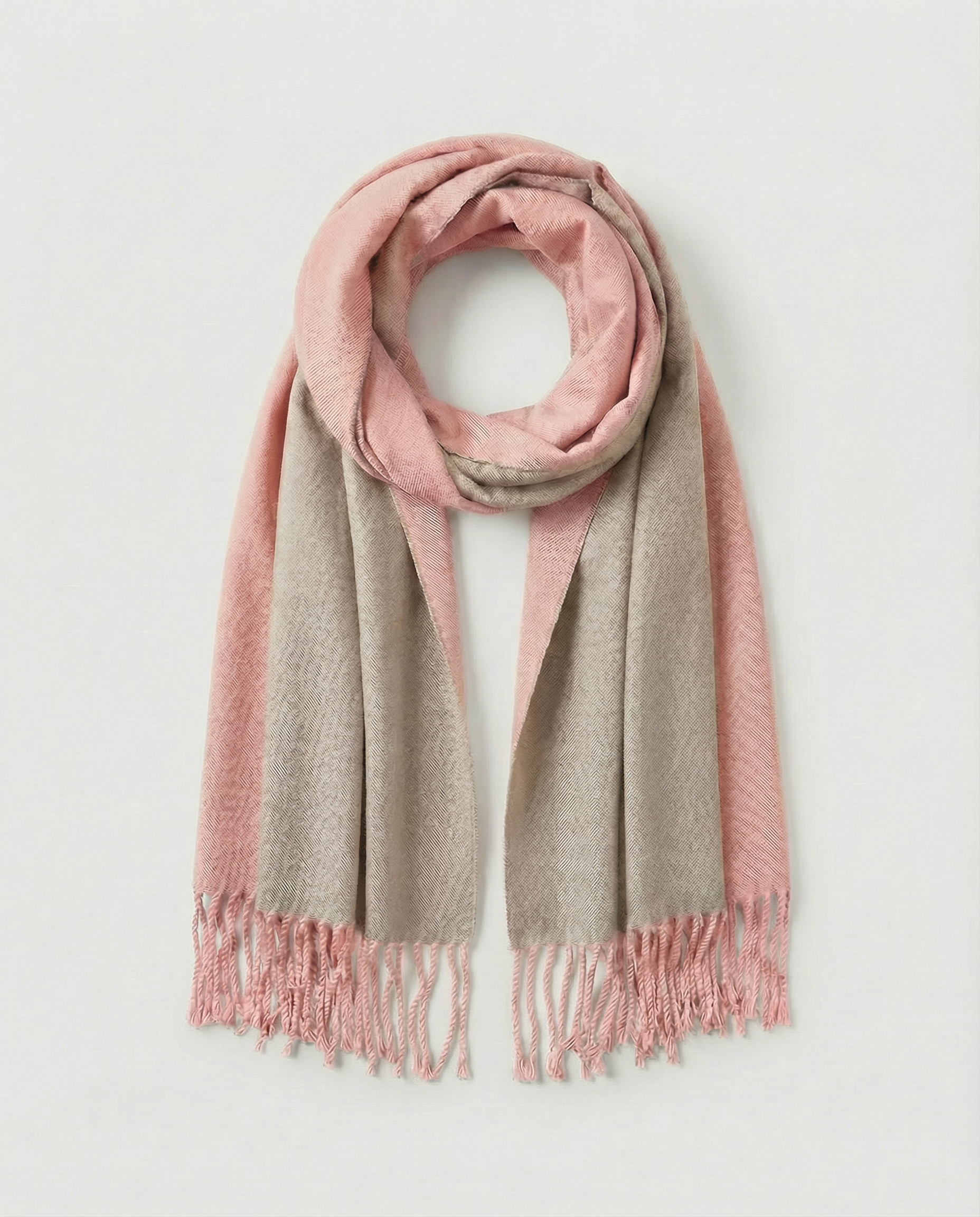 Pink and Grey beige wrap with fringes on a light gray background