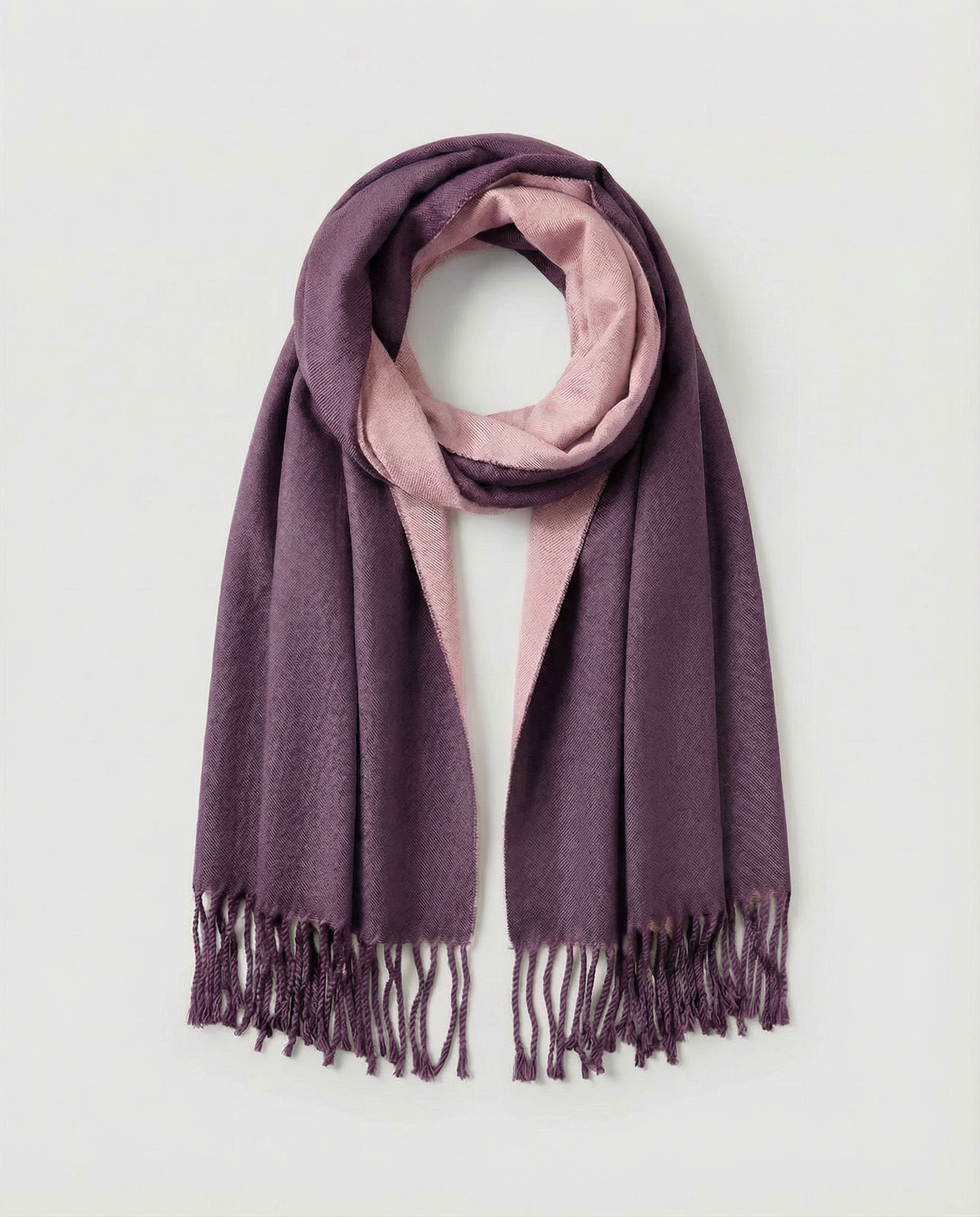 Purple wrap with pink center draped over a white background