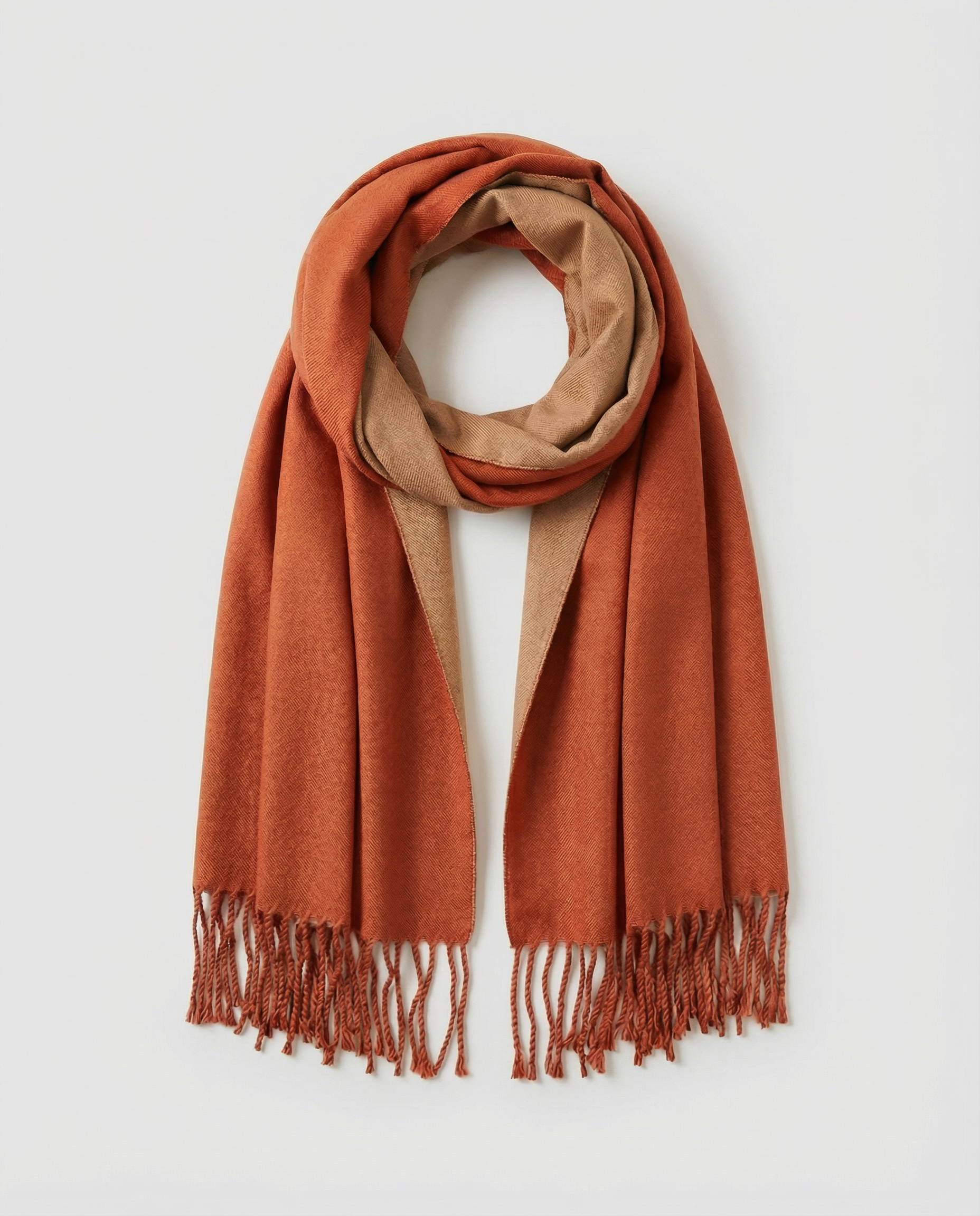 Orange wrap with fringes on a light gray background