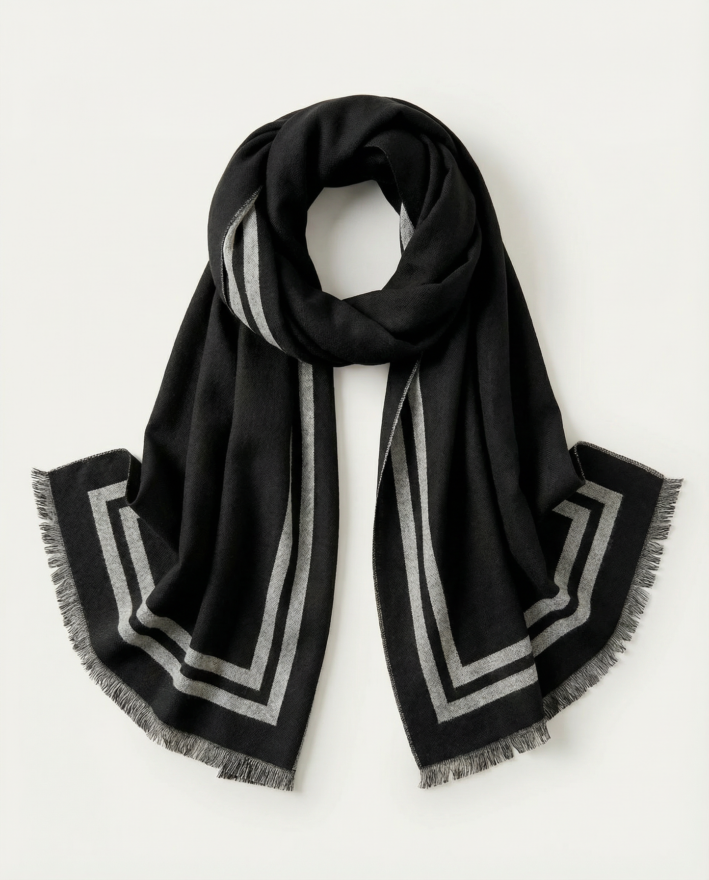 Black scarf with gray geometric patterns on a light gray background