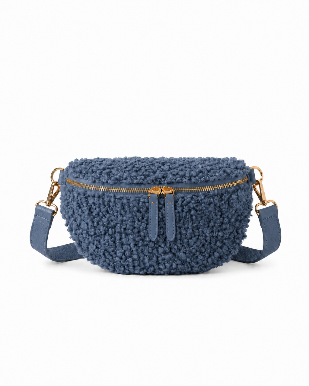 Stylish denim teddy fabric and leather fanny bag with an adjustable strap.