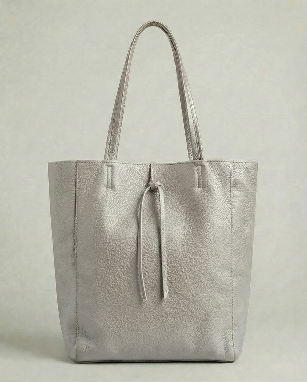 Platinum pebble leather tote bag available in Tote Bag and Mini Tote sizes. 