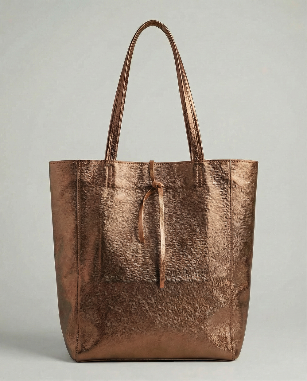 Bronze metallic leather tote bag available in Tote Bag and Mini Tote sizes. 