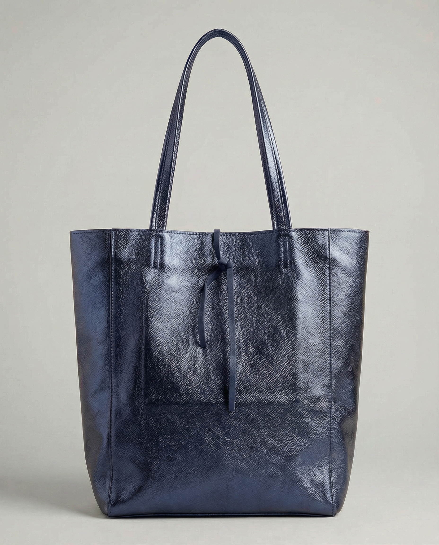 Indigo metallic leather tote bag available in Tote Bag and Mini Tote sizes. 