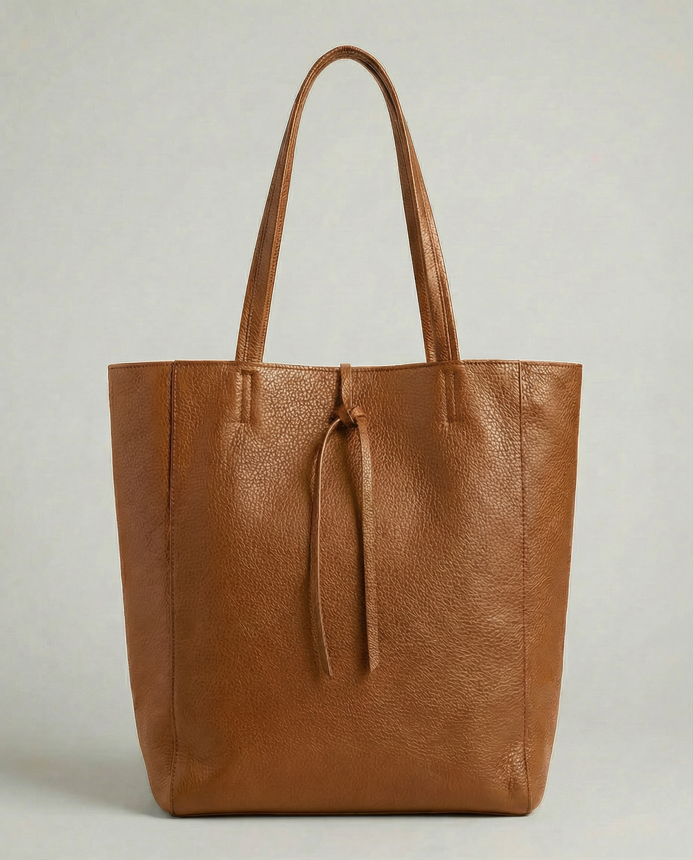 Caramel pebble leather tote bag available in Tote Bag and Mini Tote sizes. 
