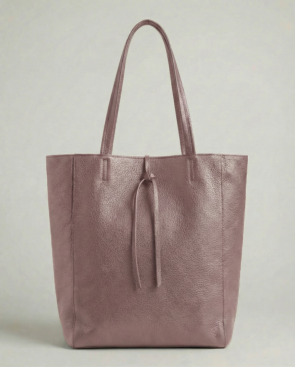 Lilac pebble leather tote bag available in Tote Bag and Mini Tote sizes. 
