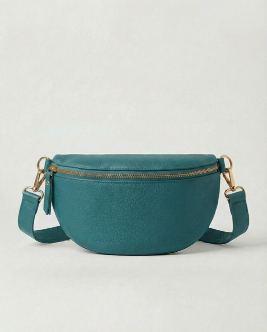 Turquoise pebble leather fanny bag with adjustable strap and compact, hands‑free design.