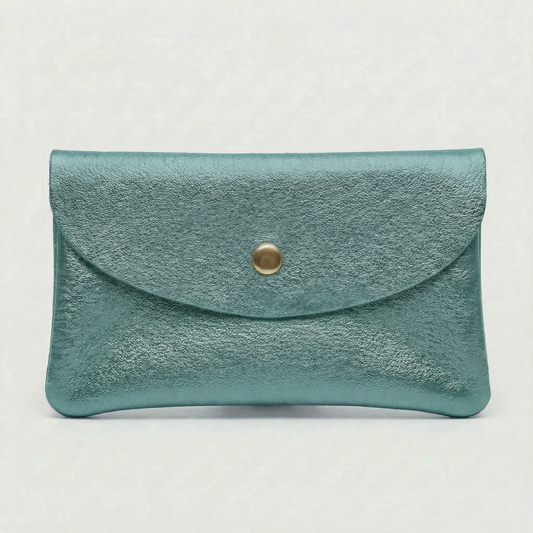 Mini coin wallet in turquoise metallic leather with snap closure, compact Italian‑made design for coins and small essentials
