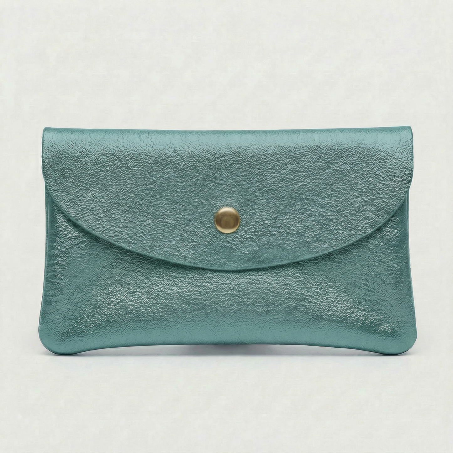 Turquoise metallic leather coin wallet with textured finish, snap closure, compact Italian‑made design, stylish everyday accessory