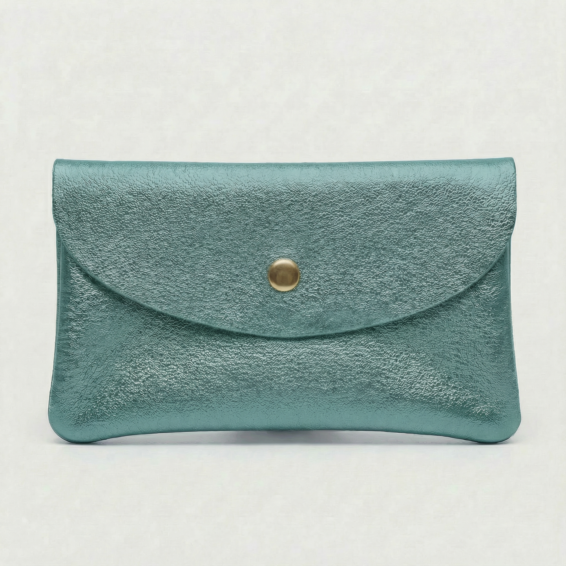 Turquoise metallic leather coin wallet with textured finish, snap closure, compact Italian‑made design, stylish everyday accessory