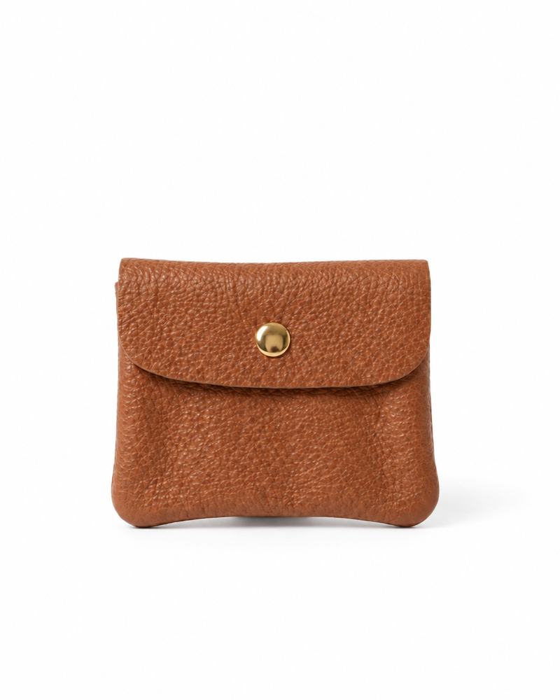 Caramel pebble leather wallet collection featuring Mini Coin Wallet, Coin Wallet, and Cellphone Wallet in genuine leather, made in Italy.